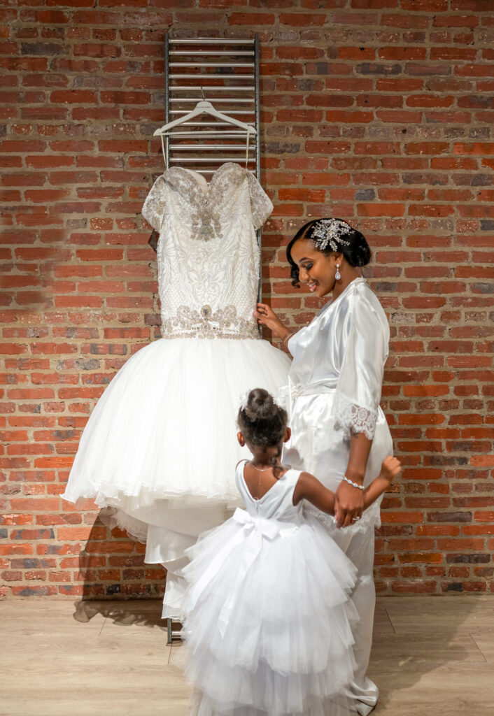 Bride with bridal gown and daughter 